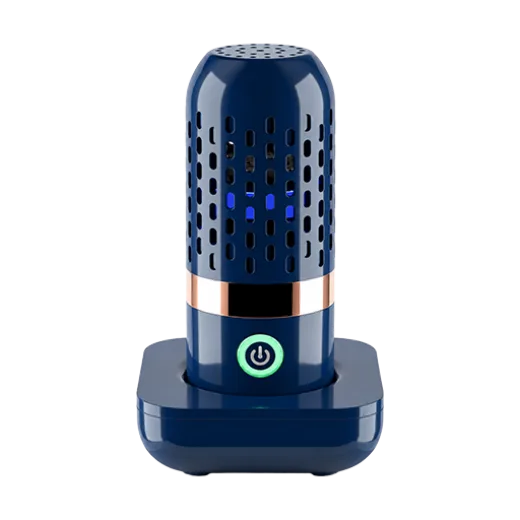 PodBloom produce cleaner device in navy blue standing on its wireless charging base